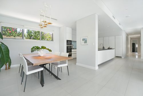 Dining area and part of a kitchen.